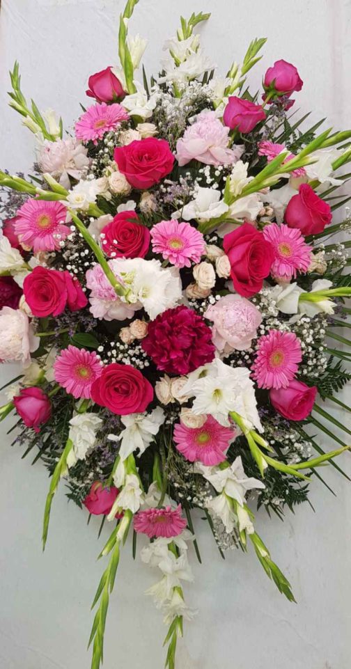 Almohadón rosa funeraria